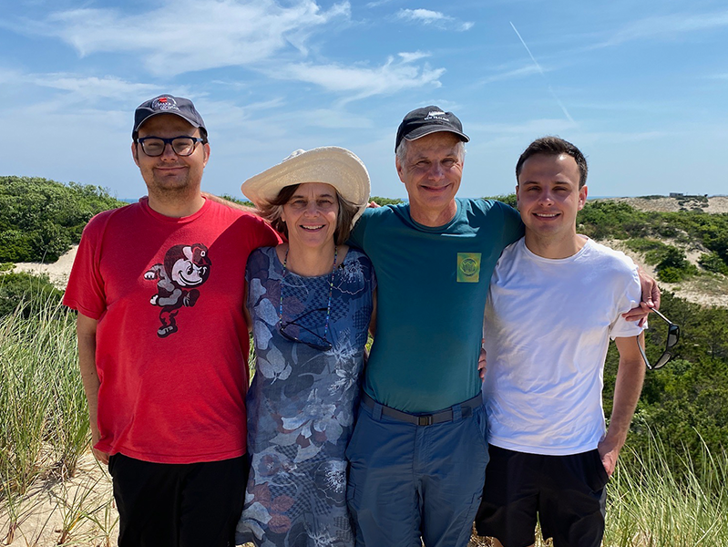 Ben, Carol, David and Harrison outside on a sunny day in Cape Cod in 2022