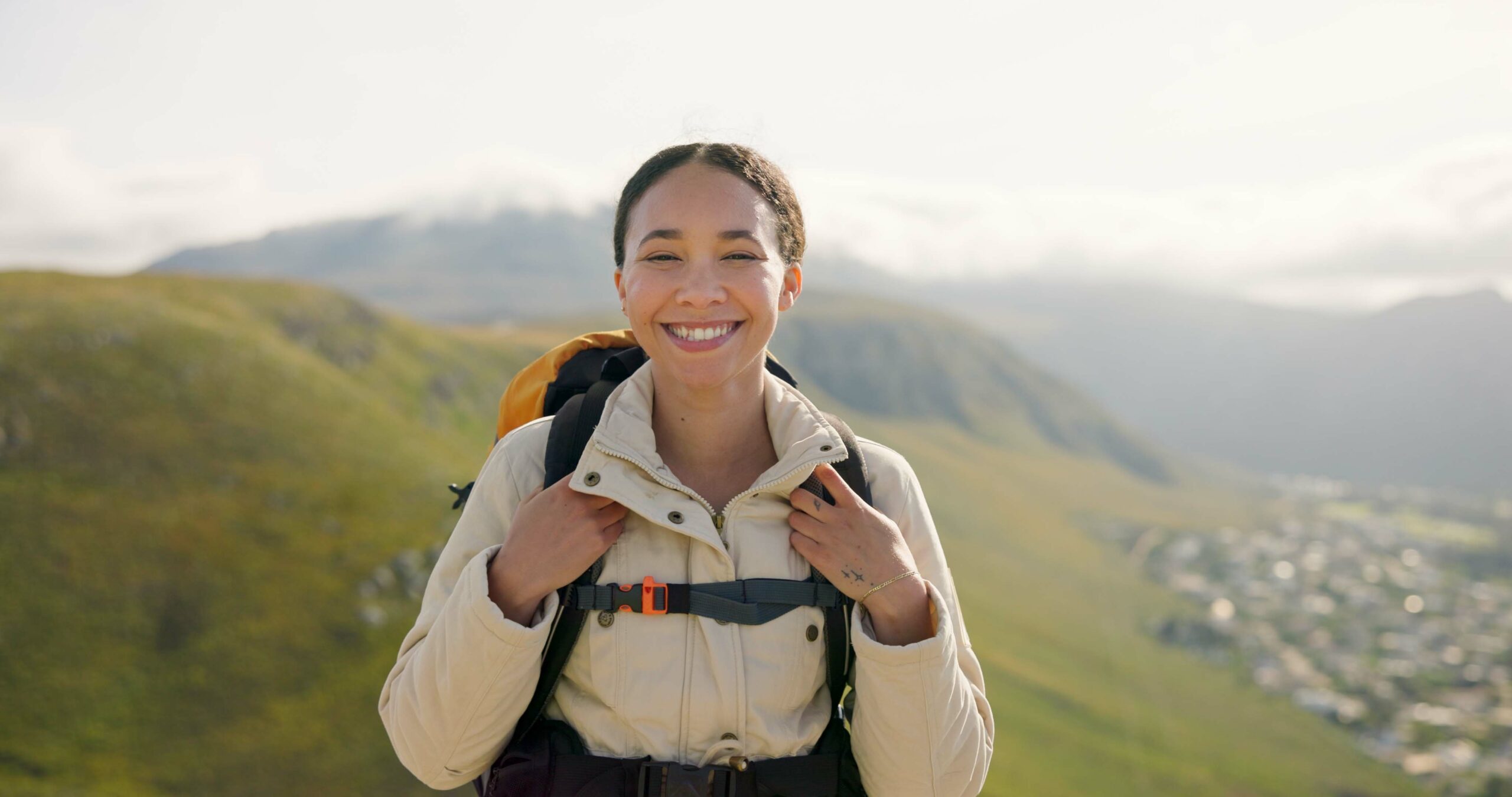 happy-woman-face-and-backpack-with-mountain-for-h-2025-04-06-07-40-50-utc